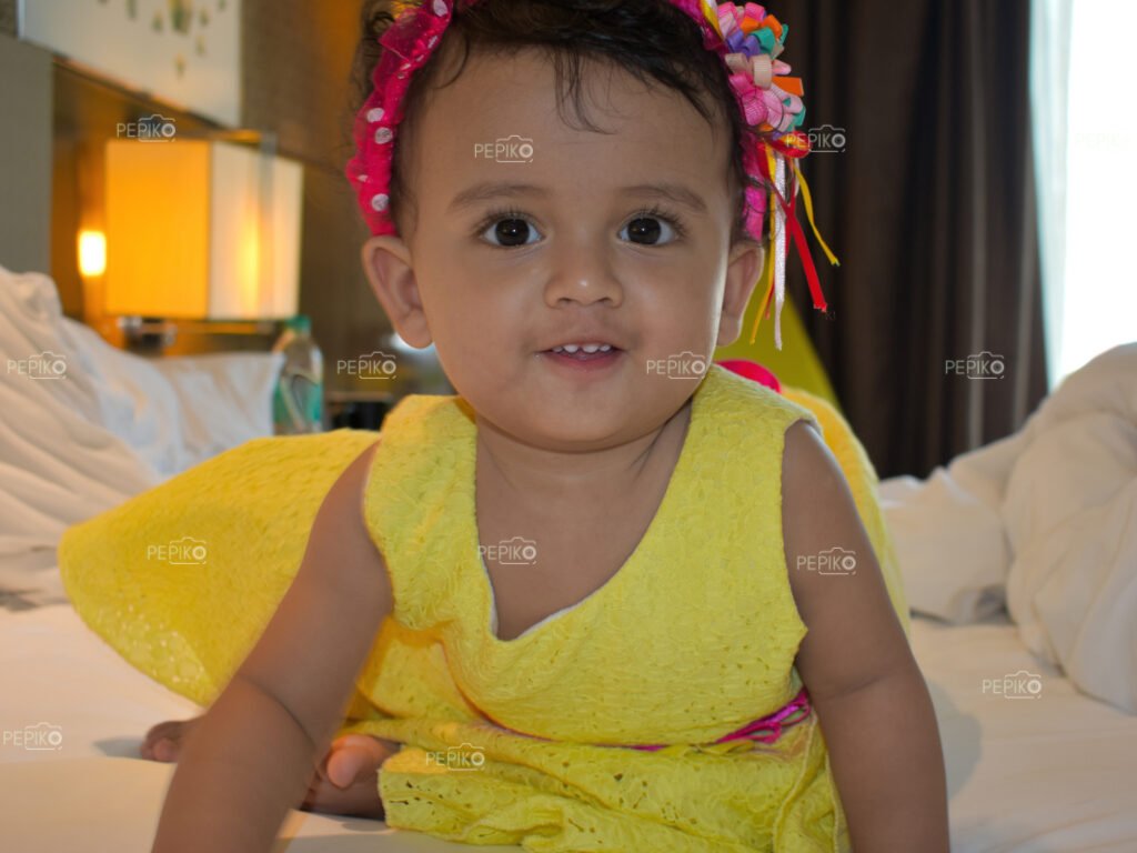 Super cute child picture looking at you with smile