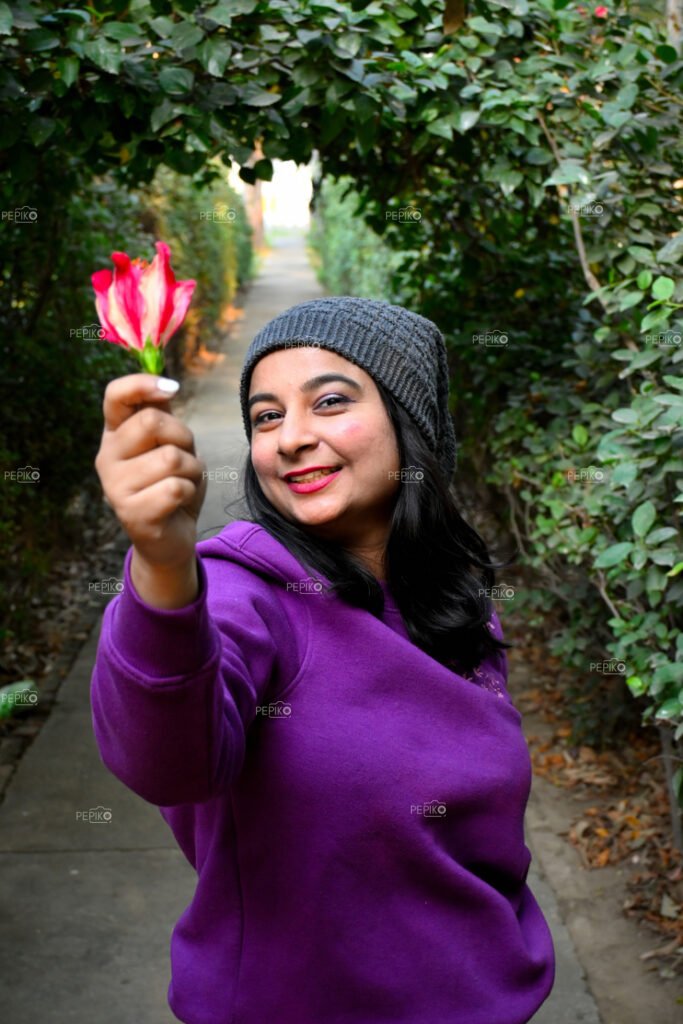 Beautiful picture of charming girl with flower